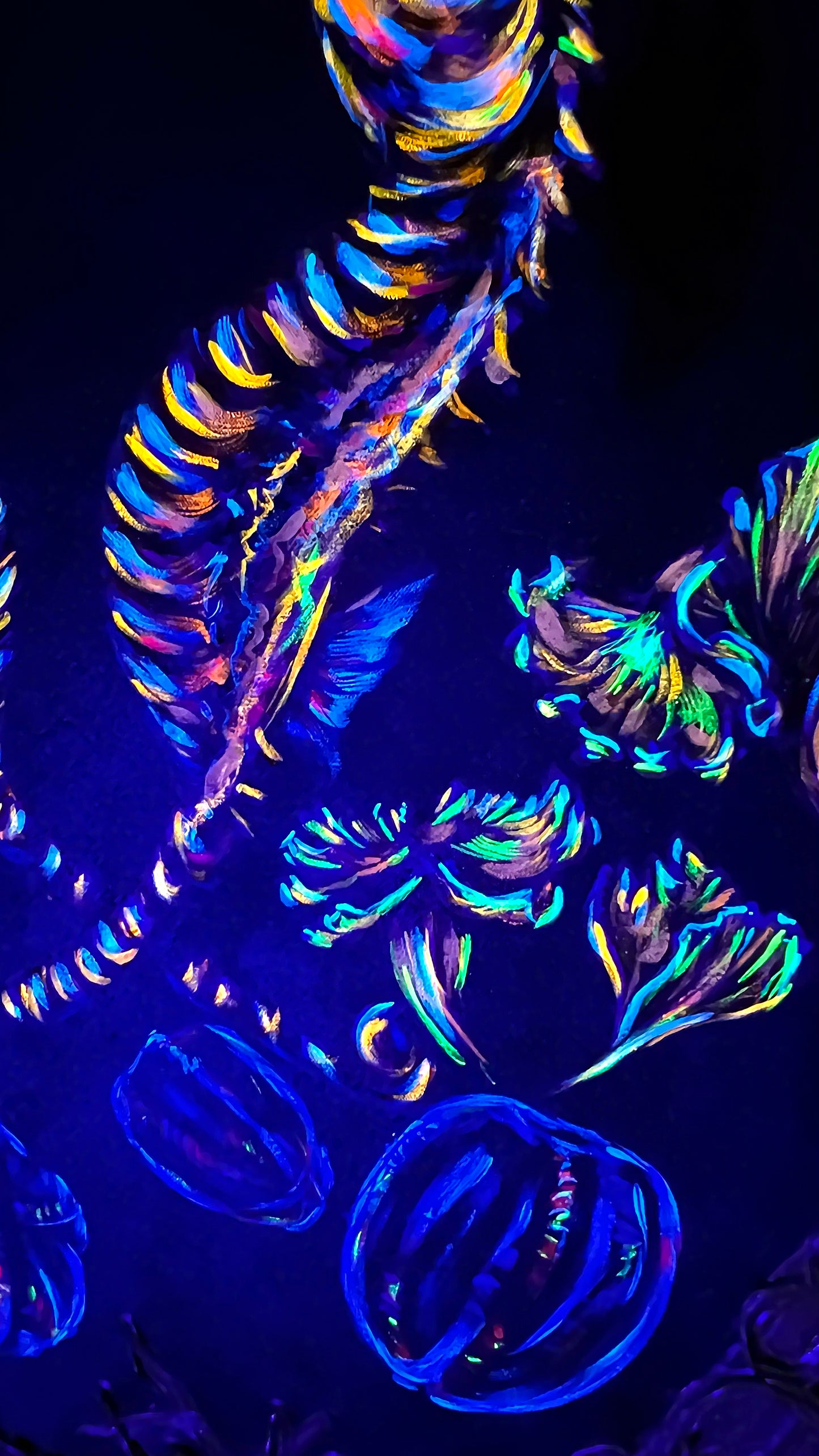 Neon-colored abstract pattern on a dark background