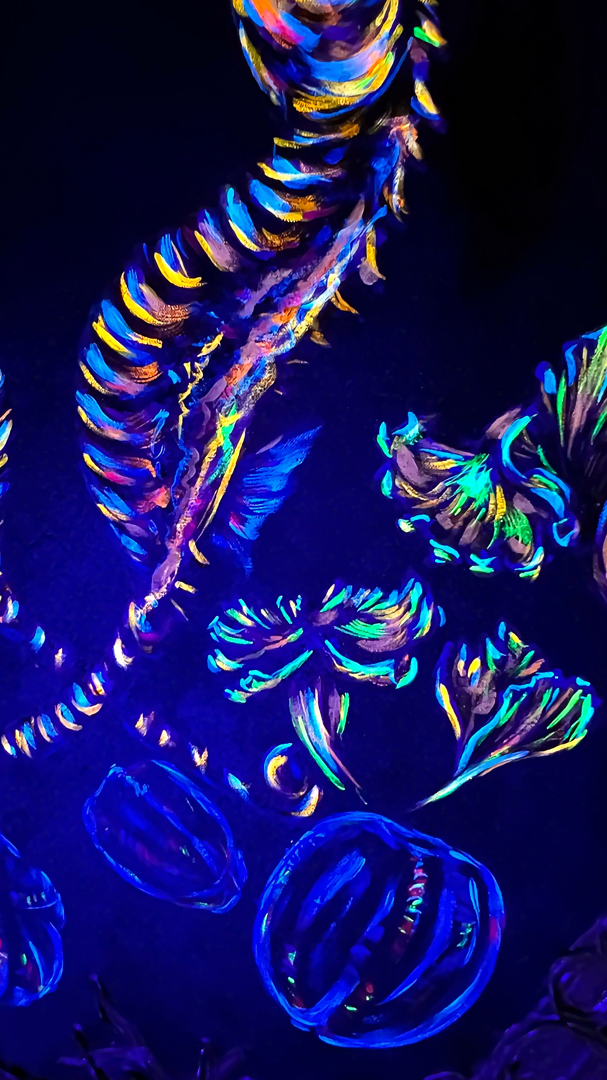 Neon-colored abstract pattern on a dark background